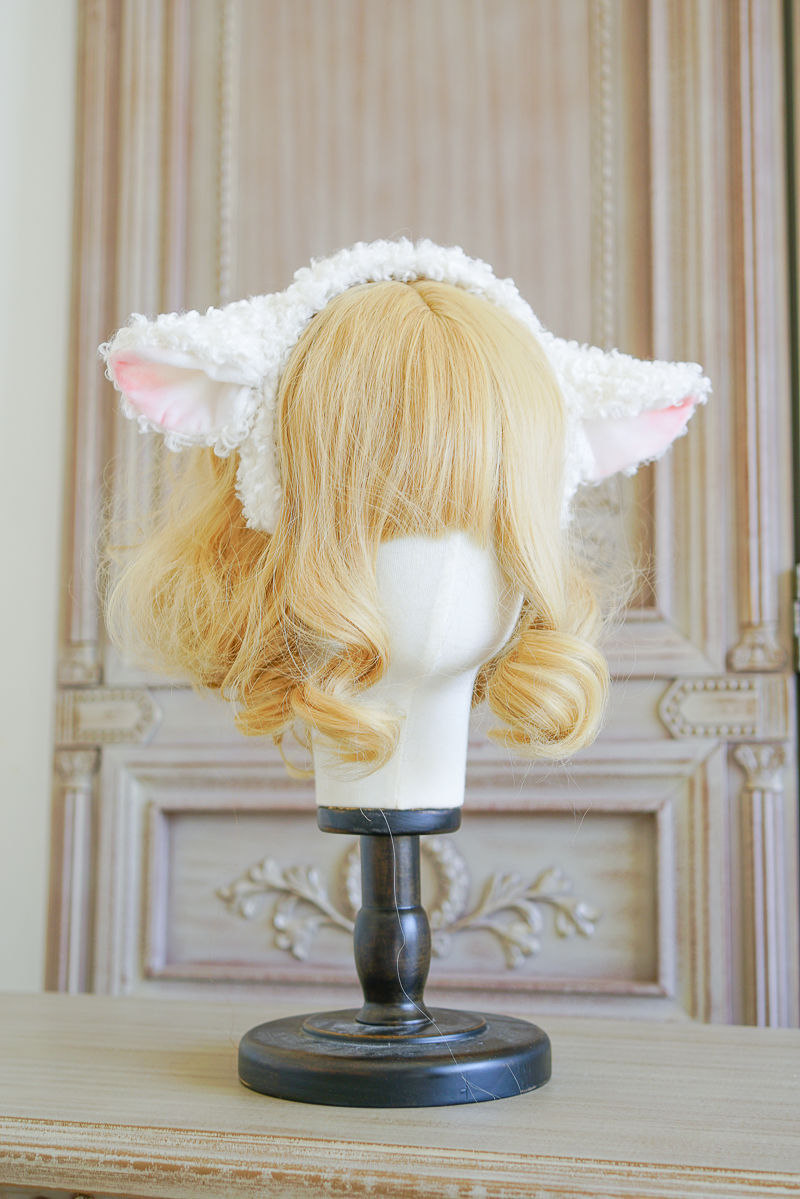LolitaFetch handmade sheep ear headband, a cute animal hair accessory with plush sheep ears for a whimsical look.