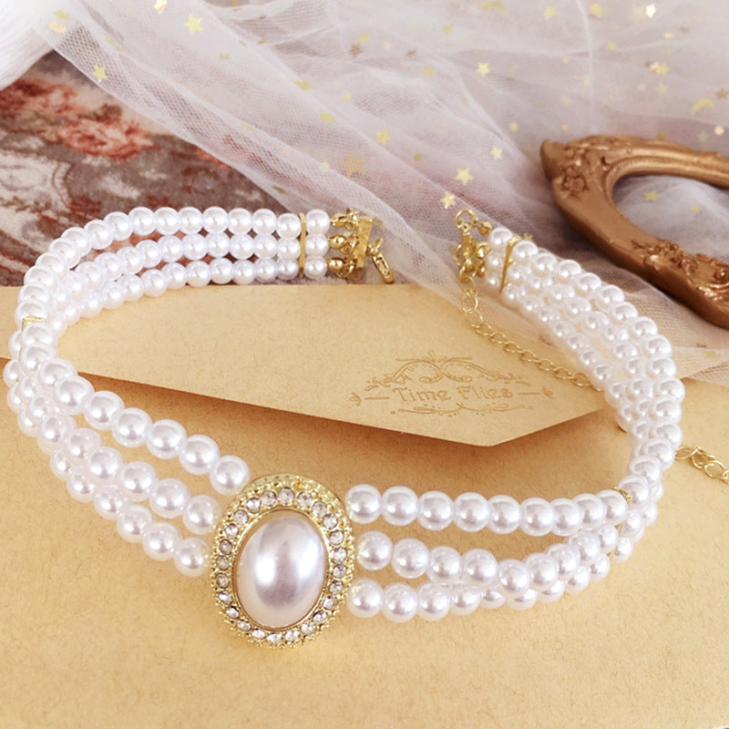 Vintage Multi-layer Imitation Pearl Necklace Classical Lolita Three-layer Choker Hepburn Hong Kong Style Short Collarbone Cha