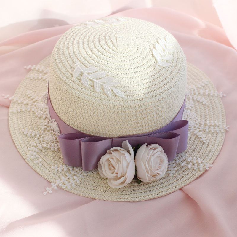 Elegant Lolita Daily sun hat with a bowknot, straw material, versatile headdress from LolitaFetch, perfect for sunny days and fashion.