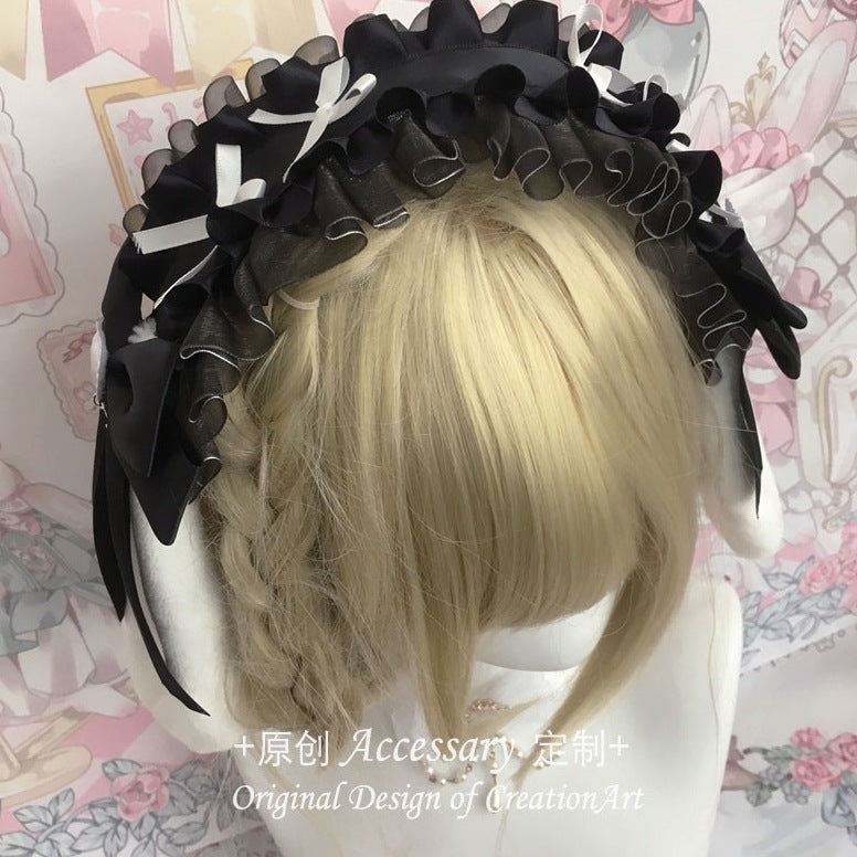 Black and pink Lolita lace headdress with bow, featuring white accents, perfect for girl’s Lolita fashion accessories.