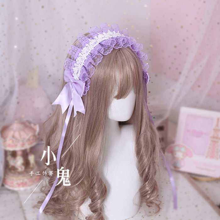 White lace soft girl Lolita headband with dark gothic accents, versatile hair accessory by LolitaFetch featuring elegant lace detailing.