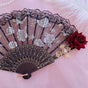 Black fan + burgundy rose