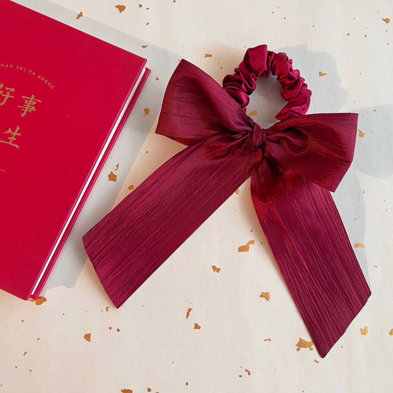 Handmade wine red Lolita fashion bow hairband with ruched design, perfect for New Year celebrations, by LolitaFetch.