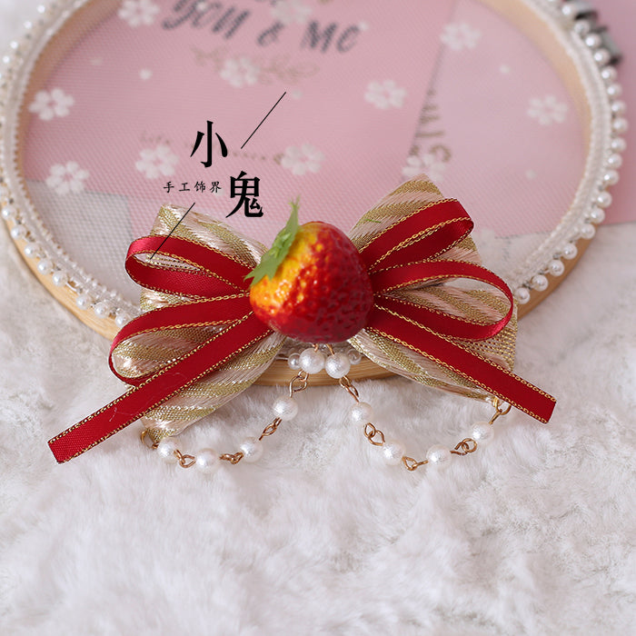 Strawberry Sweet Lolita plaid bow hair clip by LolitaFetch, featuring a cute side hair accessory in soft girl Mori style.