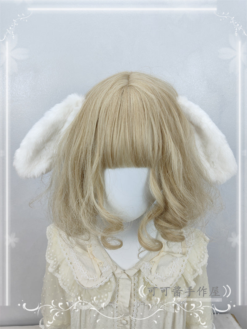 Pure white plush rabbit ear hair clip and headband from LolitaFetch, featuring realistic lop ear design for cosplay and Lolita fashion.