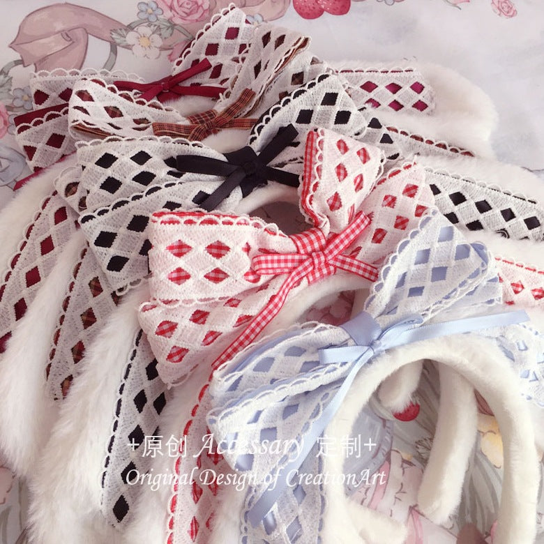 LolitaFetch cute lop ear rabbit bow headband worn by a girl, featuring adorable rabbit ears and a charming bow for Lolita style fashion.