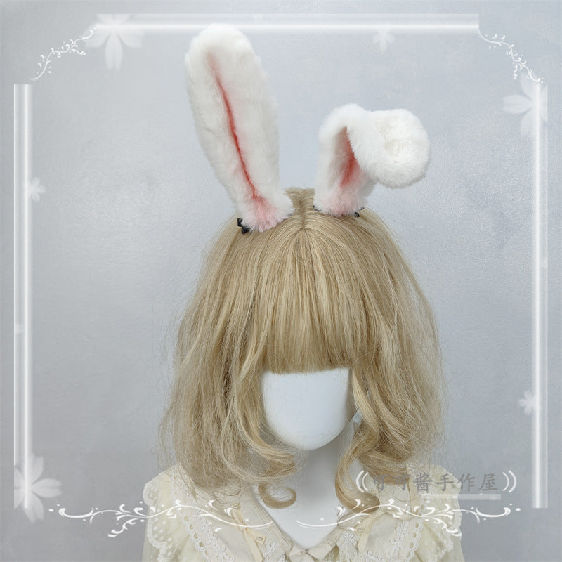 Pure white plush rabbit ear hair clip and headband from LolitaFetch, featuring realistic lop ears, perfect for cosplay or Lolita fashion.