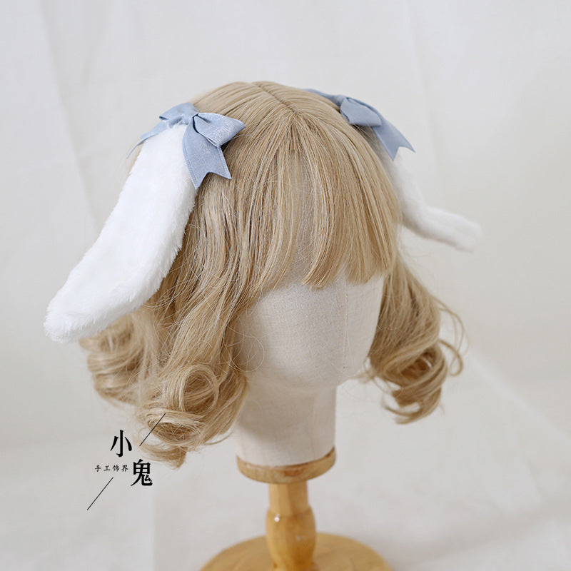Handmade Sweet Ears Lolita bunny ear bowknot hair clip worn with Lolita fashion dress by LolitaFetch.