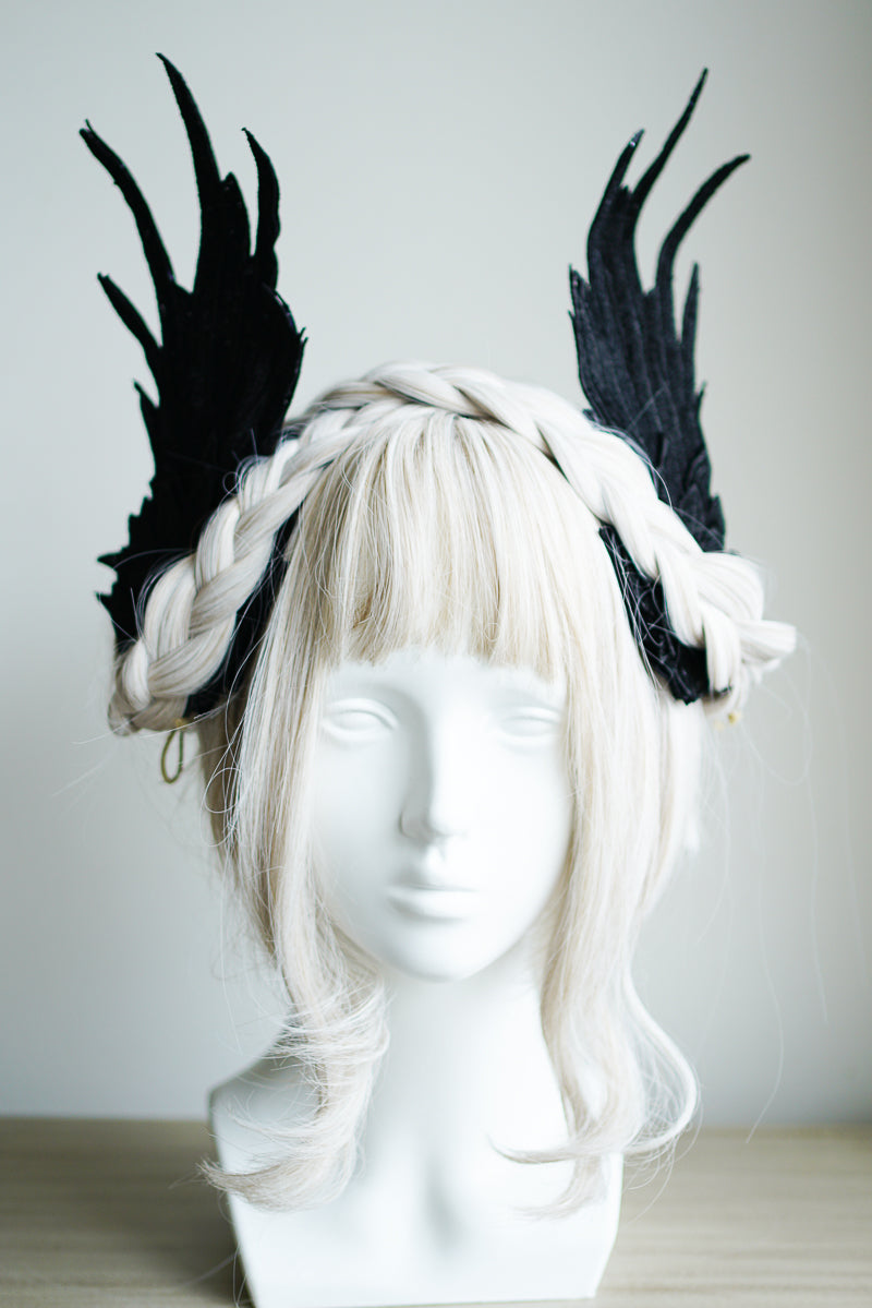 Black and white embroidered angel wings Lolita headdress with feather details and two-tone design, styled as a hair clip.