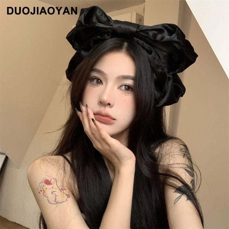 Handmade oversized satin and lace LolitaFetch hairband with a large bow, perfect as a Lolita-style headwear accessory.