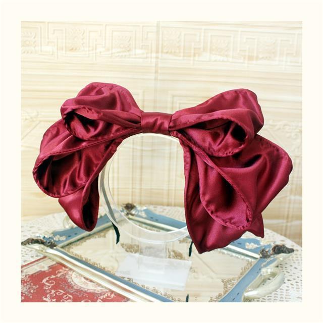 Handmade oversized satin and lace LolitaFetch hairband with a large bow, perfect as a Lolita-style headwear accessory.
