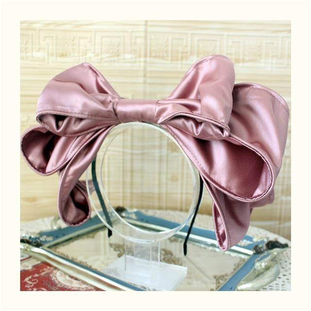 Handmade oversized satin and lace LolitaFetch hairband with bow, styled as a cute Lolita headwear accessory.