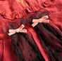 Pink and black gloves