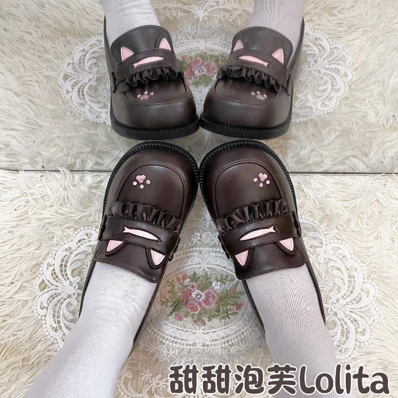 LolitaFetch Cat Academy Princess leather shoes showing elegant black shoes with bow accents and detailed stitching.