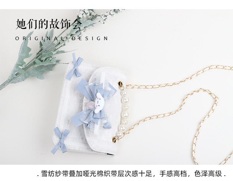 LolitaFetch Character Motif Lolita Handbag featuring Kuromi and Cinnamoroll with lace accents and detailed character designs.