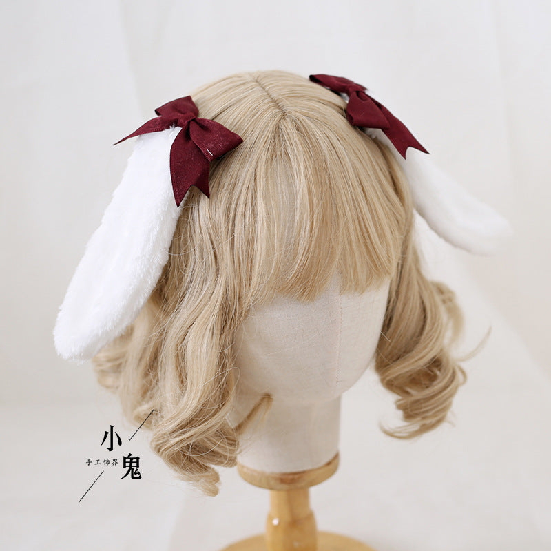 Handmade Sweet Ears Lolita bunny ear bowknot hair clip on LolitaFetch OP dress for a cute, elegant Lolita fashion look.