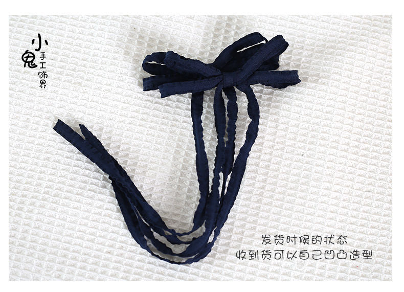 LolitaFetch double ponytail twist hair clip featuring pastel colors, ideal for Lolita and sweet hairstyle accessories.