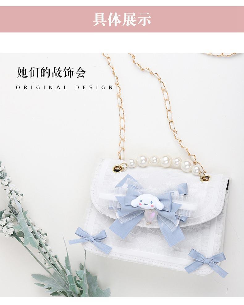 LolitaFetch Character Motif Lolita Handbag featuring Kuromi and Cinnamoroll with lace accents and detailed character designs.