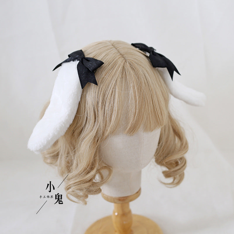 Handmade Sweet Ears Lolita bunny ear bowknot hair clip for Lolita fashion, featuring playful bunny ear design and delicate craftsmanship.