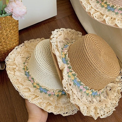 French Lolita lace trim straw hat with wide brim and flat top, perfect for summer women’s fashion and elegant headdresses.