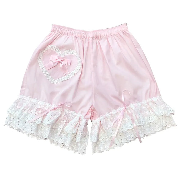 Pink Lolita bloomers with layered white lace hems and a small bow.