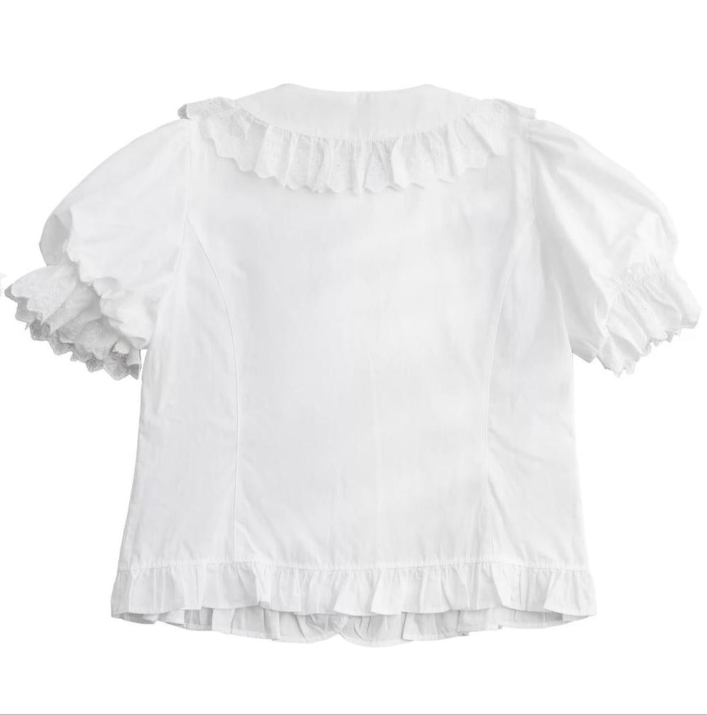 Forest green short-sleeve Lolita blouse with Peter Pan collar and ruffled trim.