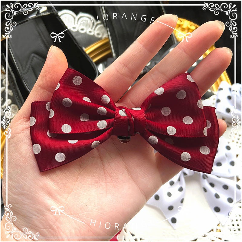 Girly multicolor polka dot LolitaFetch shoe clips with bowknot design, versatile accessory for headdress or footwear.