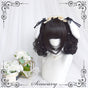 black - doll curls, only a pair of ponytails