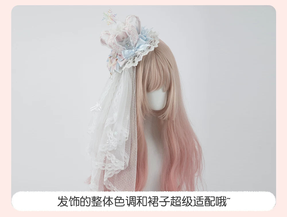 Her Vintage Society pastel pink and blue crown headwear with lace veil on a mannequin