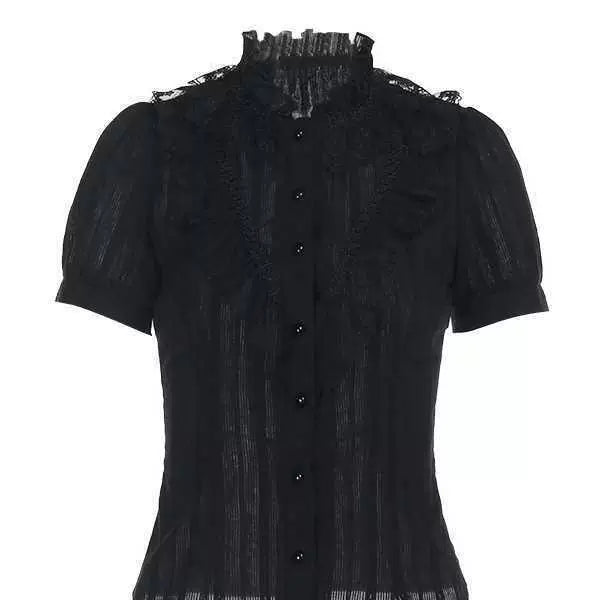 Black short-sleeve blouse with high collar, lace ruffles and button front on a model.