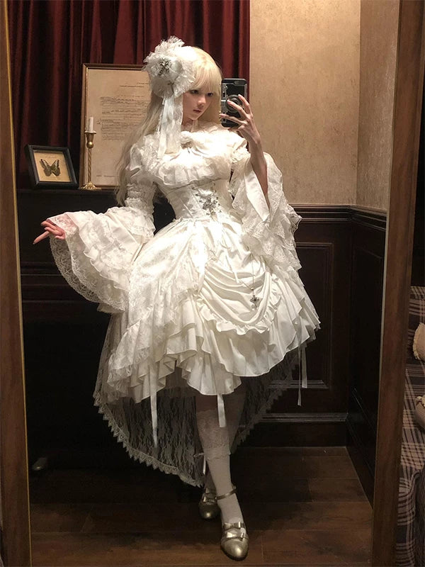 White Gothic Lolita dress set with voluminous sleeves and layered skirt ruffles