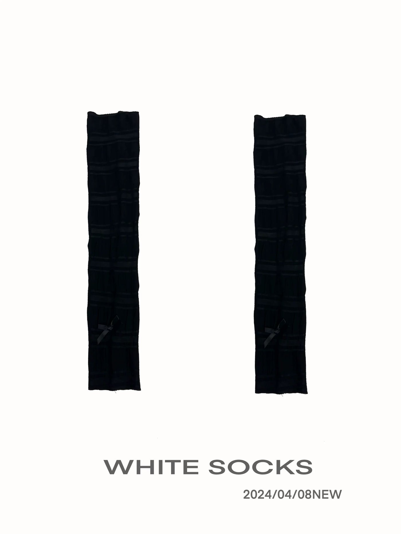 Black balletcore Lolita slouch mid-calf sock with ruched panels and ankle bow