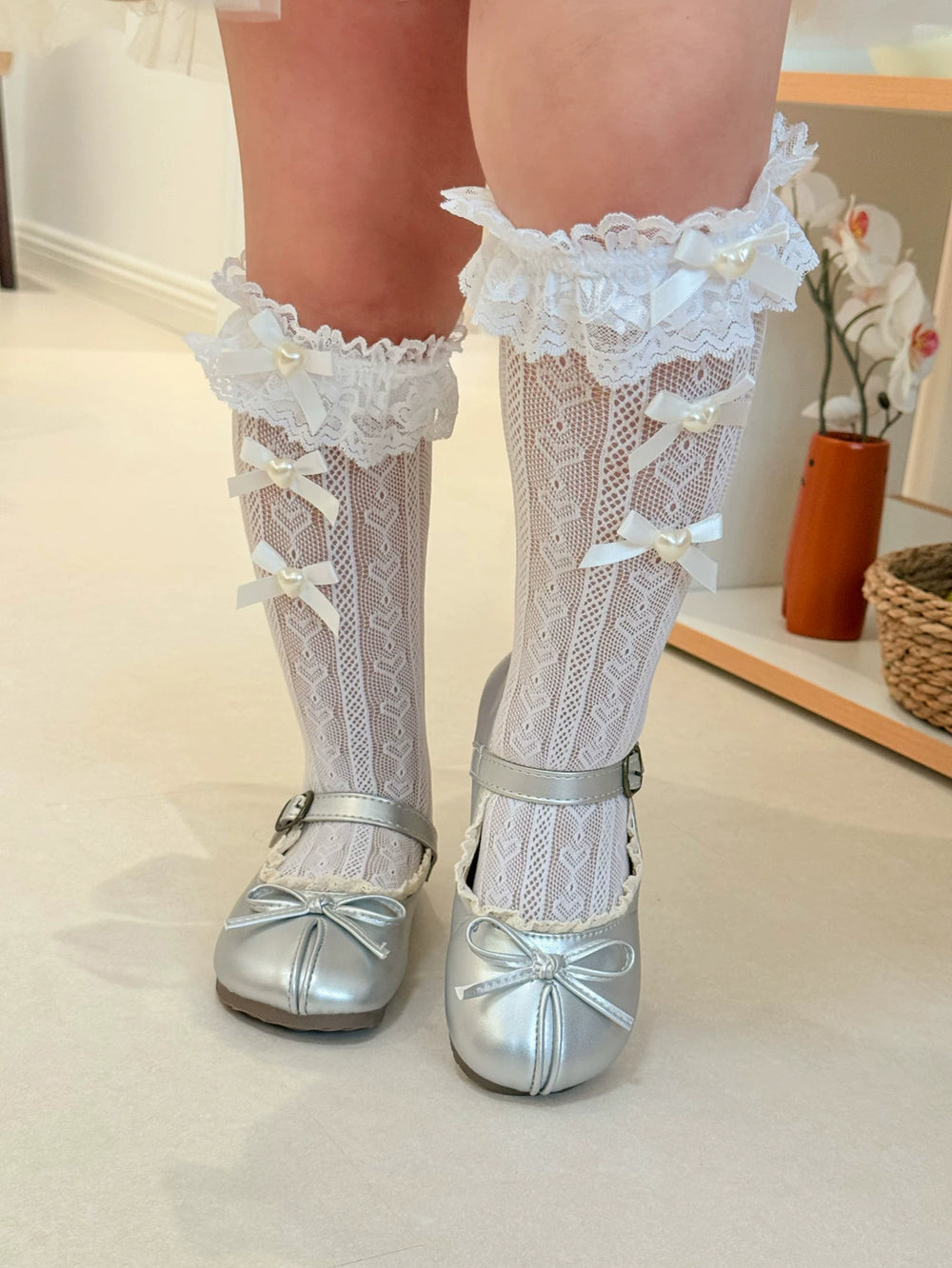 Fantasy Doll lace short socks with ruffled cuffs, bows, and heart accents