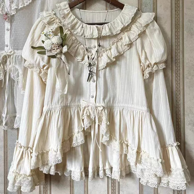 Natural-tone Lolita blouse with a ruffled collar and lace-trimmed sleeves