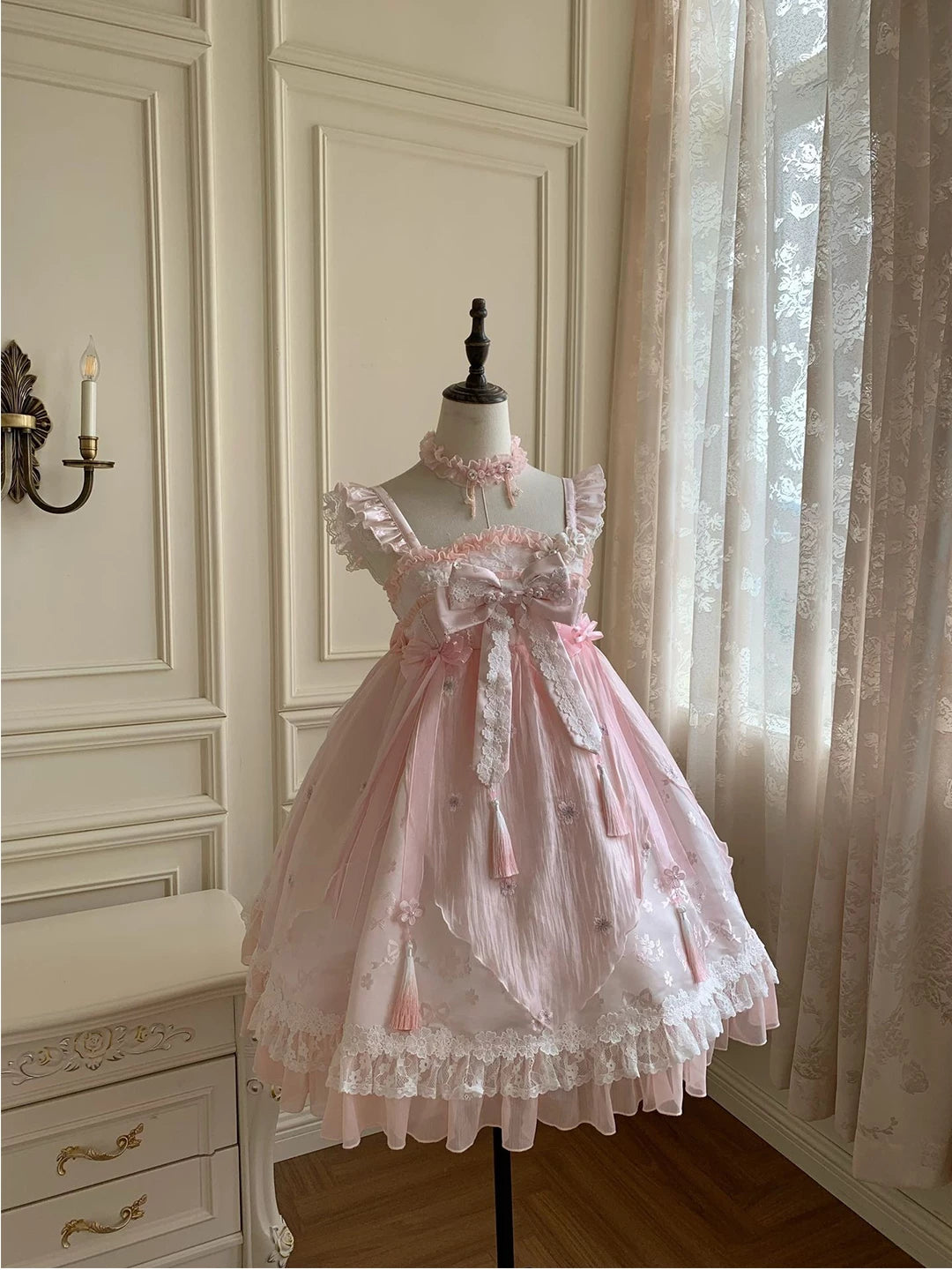 Pink high-waisted JSK dress with ruffles, bows, floral lace and tassel details