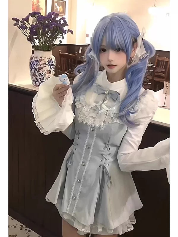 Blue Lolita shorts set with lace-trimmed blouse, flared sleeves and bow tie