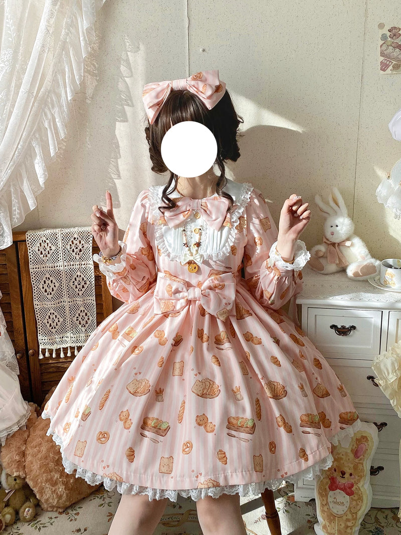 Mint green long-sleeve sweet Lolita OP dress with bread and pastry print, lace trim, and bow accents