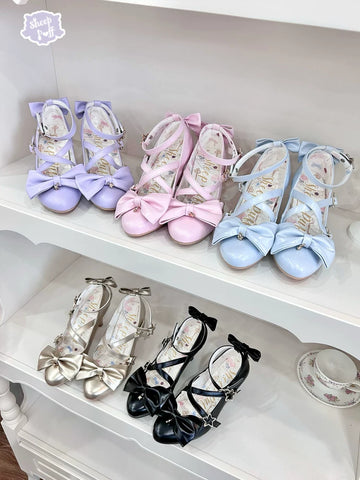 Sheep Puff Starry Dream Lolita heels featuring a starry pattern, pastel colors, and decorative bows on elegant shoes.