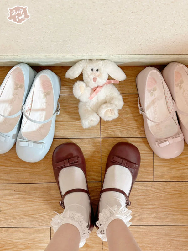Sheep Puff porcelain doll-themed Lolita shoes with low heels, featuring detailed sheep puff design and classic footwear style.