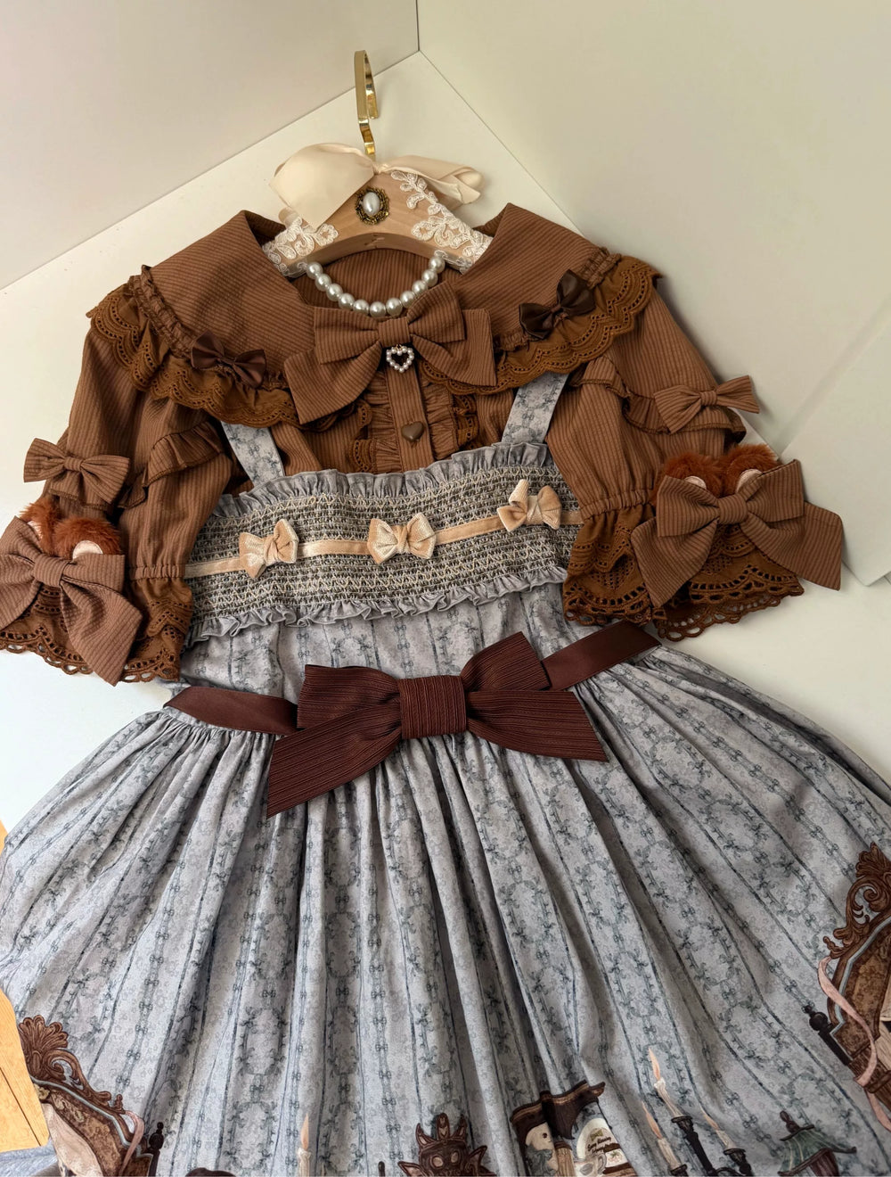 Little Ears Lolita styling shown in brown and blue plaid layers with bows and lace trim.