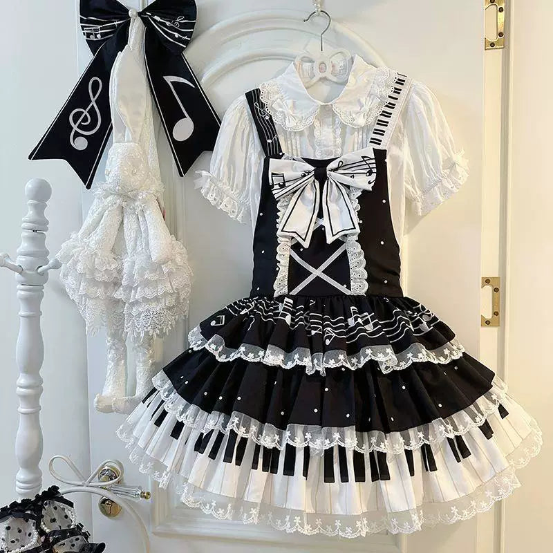 Sweetheart Dream Machine black-and-white piano-key JSK dress with layered skirt and large bow