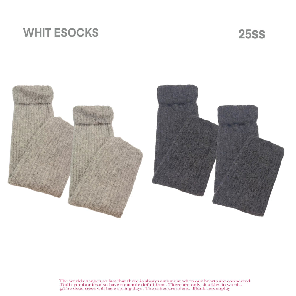 Neutral knit sock pairs displayed on a white background