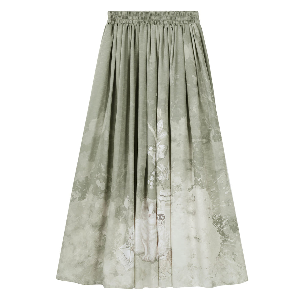 Green tea-length skirt with floral and cat print details