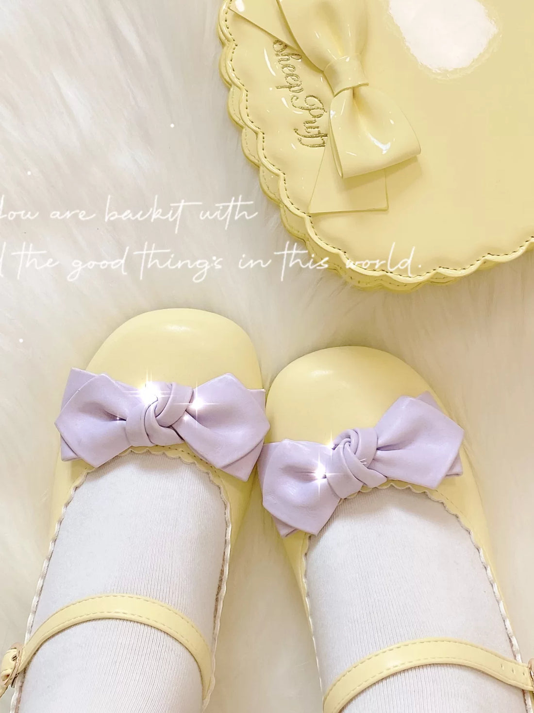 Sheep Puff Lolita shoes with rounded bow design in soft pastel colors, featuring a cute and playful style.