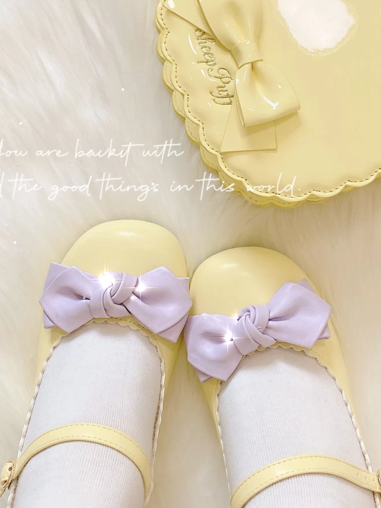Sheep Puff Lolita shoes with rounded bow design, featuring a cute and stylish look for fashion-forward outfits.