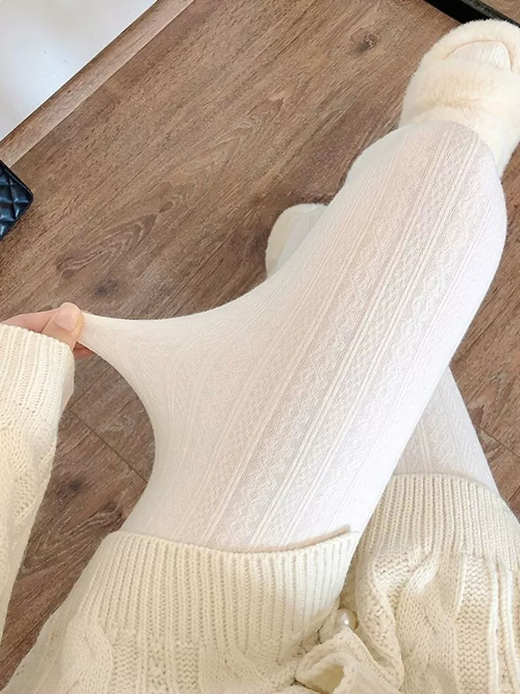 Fantasy Doll Off-white tights with vertical cable stripes.