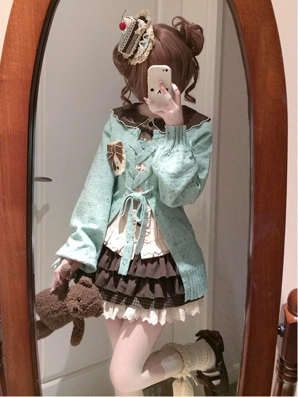 Mint jacket, shirt and short skirt shown in a Lolita mirror outfit.