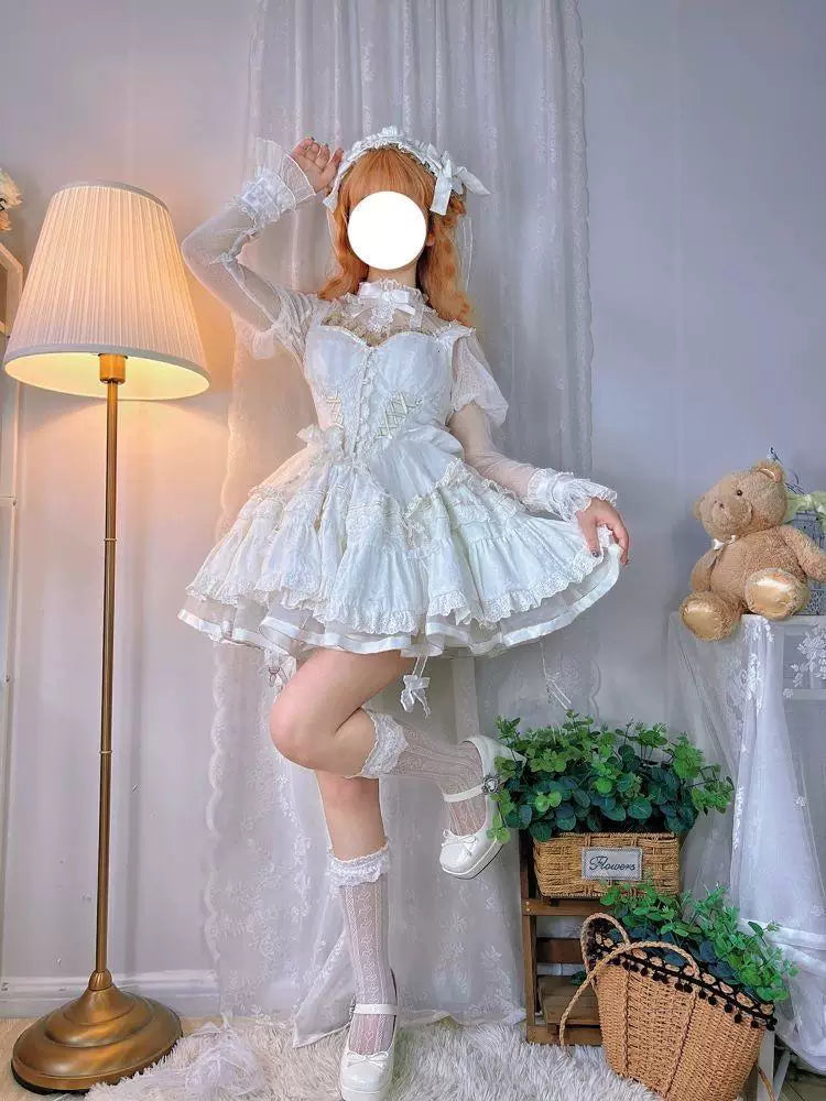 Sweetheart Dream Machine ecru Lolita top with puff sleeves and lace-mesh sleeves on a mannequin