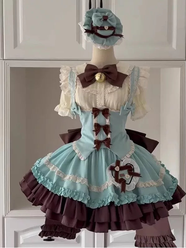 Mint and brown Lolita dress set displayed on a mannequin with layered ruffles and a large bow