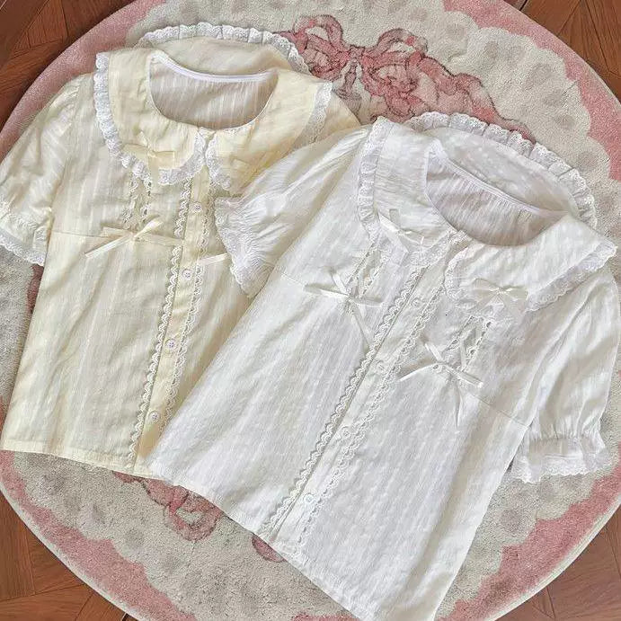 Sweetheart Dream Machine white and ecru puff-sleeve blouse with lace trim and ribbon bows